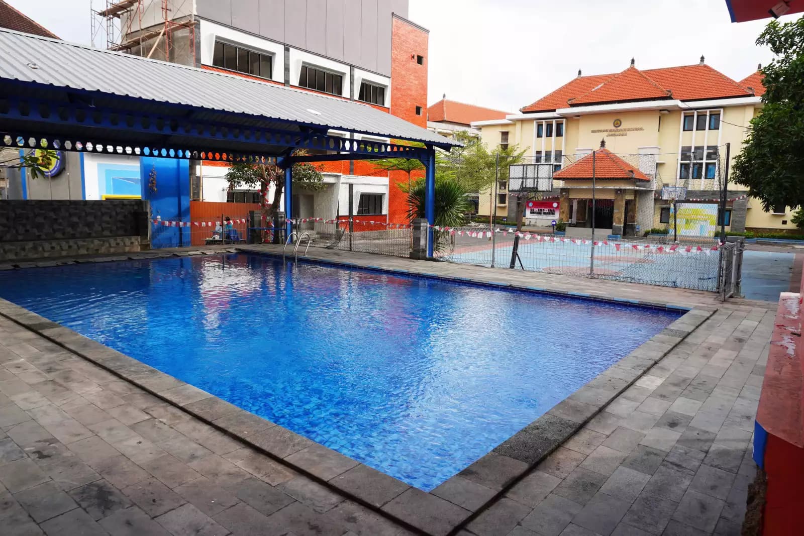 school swimming pool, swimming facilities, student aquatic area.